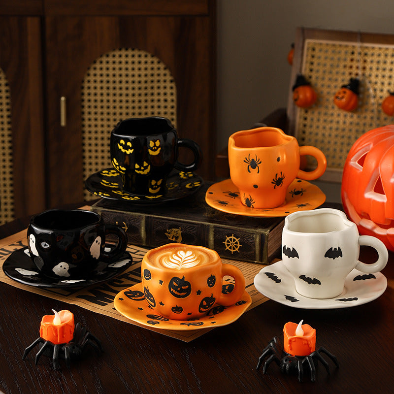 Creative halloween-themed ceramic cup and saucer set, featuring an irregular design with pumpkin and bat motifs. perfect for coffee or tea