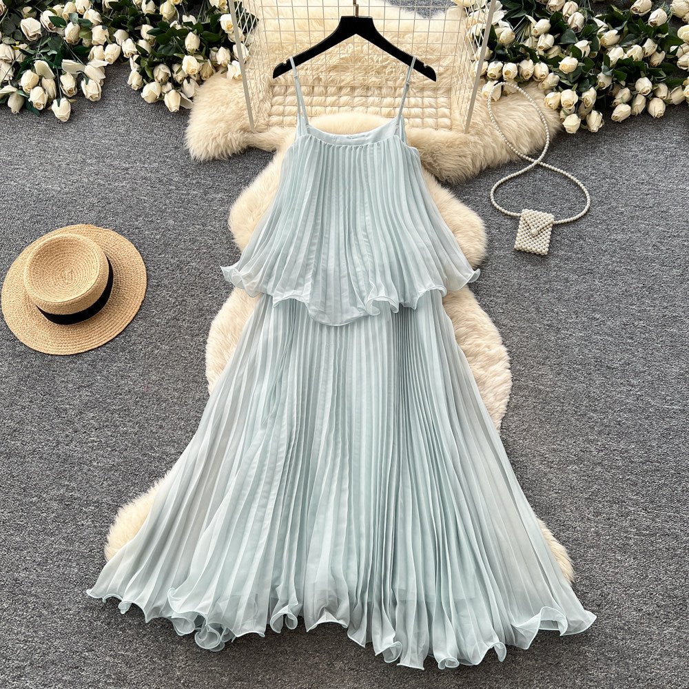 Vacation-style light blue camisole sleeveless dress for women, featuring a summer ruffle trim, high waist, slimming effect, and pleated fairy-length skirt
