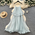 Vacation-style light blue camisole sleeveless dress for women, featuring a summer ruffle trim, high waist, slimming effect, and pleated fairy-length skirt