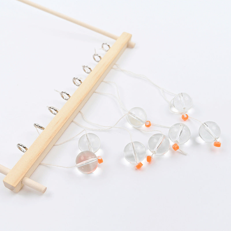 Serpentine pendulum law of conservation of energy handmade DIY technology small production students invent STEAM teaching aids classroom experiment