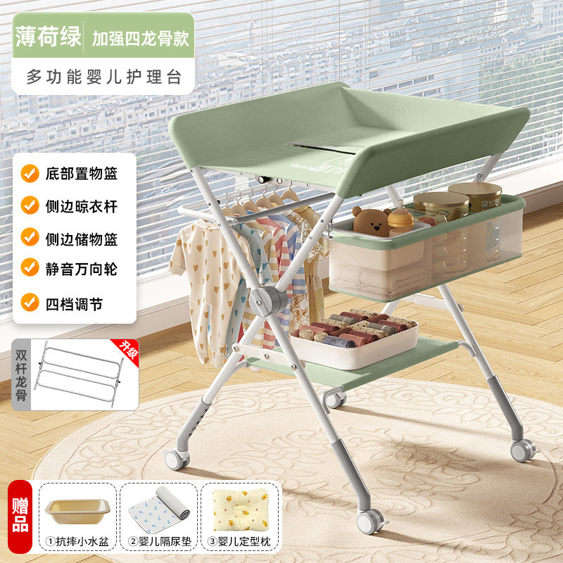 Baby changing table - newborn diaper changing, bathing, massage, and bed - foldable multifunctional baby bed