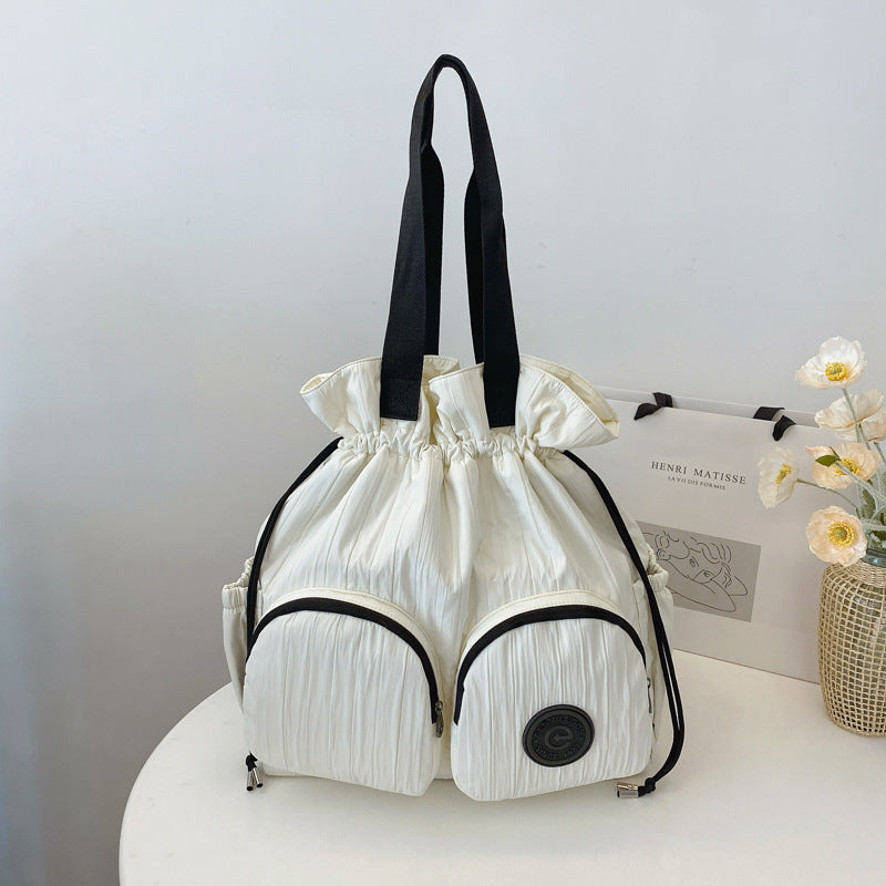 Cross-border college style high-value large-capacity backpack women's 2025 new niche pleated drawstring shoulder bag