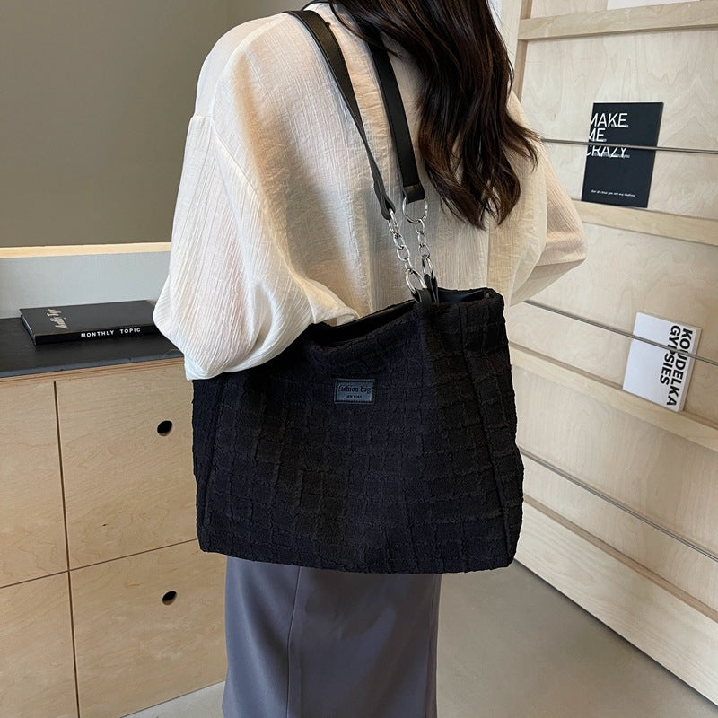 Canvas tote bag women's large capacity 2025 new casual shoulder bag summer versatile senior sense class commuter bag