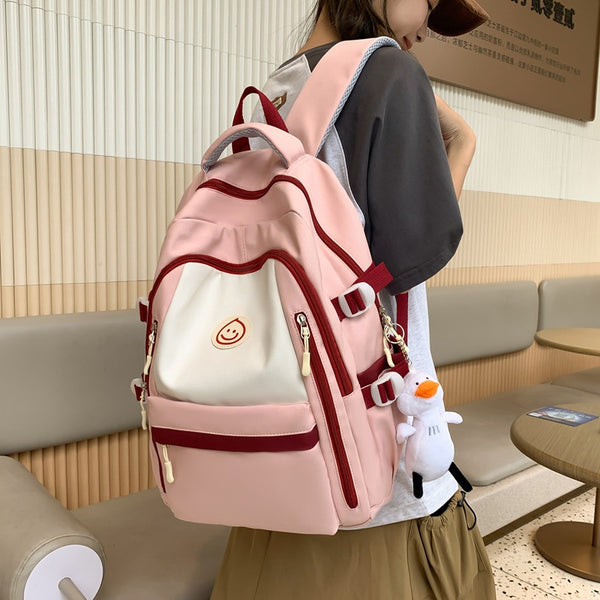 Wholesale new middle and high school student schoolbags, large-capacity nylon backpacks, fashion trend casual bags