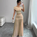 European and american cross-border women's fashion:  summer new arrival - solid color off-the-shoulder top with cinched waist pleated panel skirt two-piece set