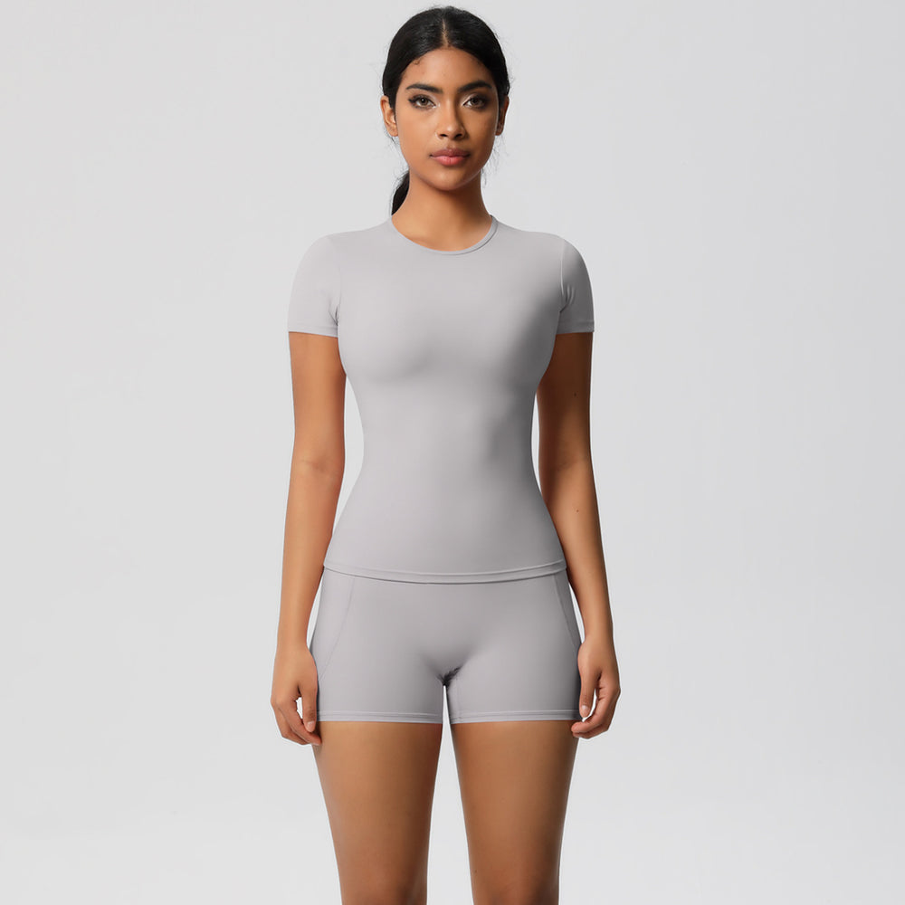 European and american style fleece-lined quick-dry short-sleeve yoga set with pocketed shorts for outdoor running and fitness