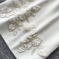 French chic beaded v-neck lace top & high-waisted midi skirt two-piece set - elegant & sophisticated