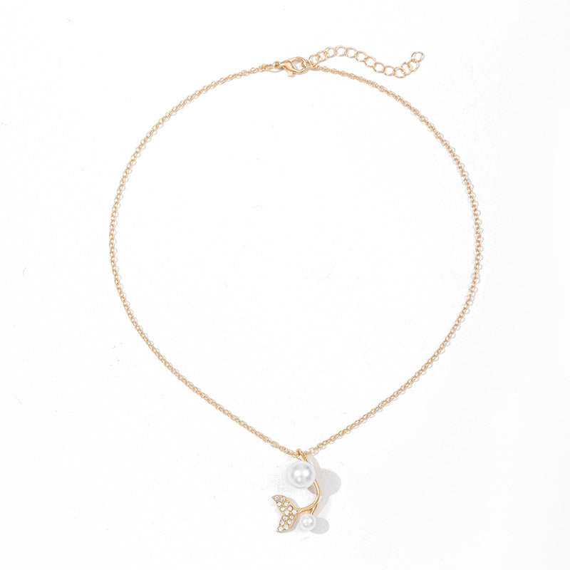 European and american cross-border e-commerce new jewelry: autumn/winter fashion pearl cross pendant versatile diamond-encrusted fishtail necklace for women