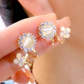 Luxury fashion floral earrings - unique studs, geometric ear cuffs, and accessories featuring geometric floral design details