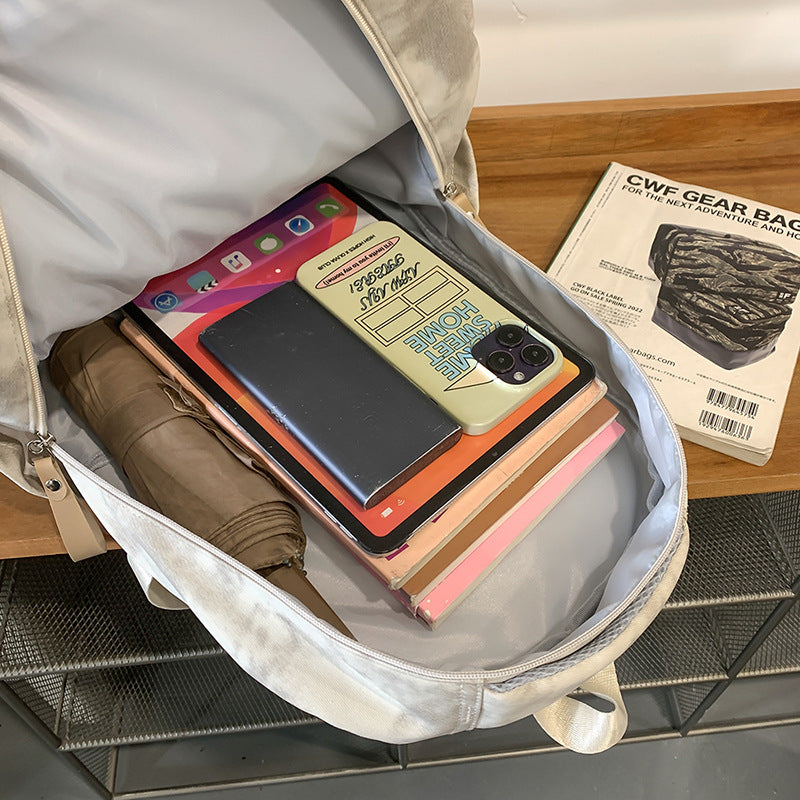 School bag female large capacity junior high school student backpack male new outdoor sports travel bag Korean version casual backpack