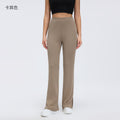 Sand-washed ribbed yoga pants for women, loose-fitting, with a flattering drape and slimming effect. wide-leg, slightly flared, with a slit detail. perfect for sports and fitness. style d26024