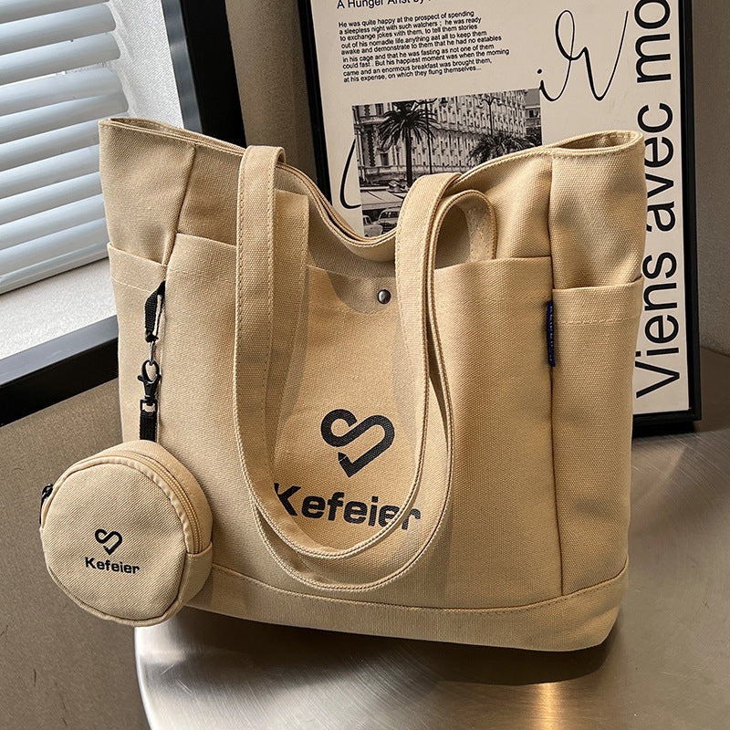 Canvas bag, women's large-capacity 2023 new high-end shoulder bag, college student class versatile commuter tote bag