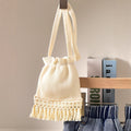 Girls' and boys' floral tassel top, denim shorts, and backpack set