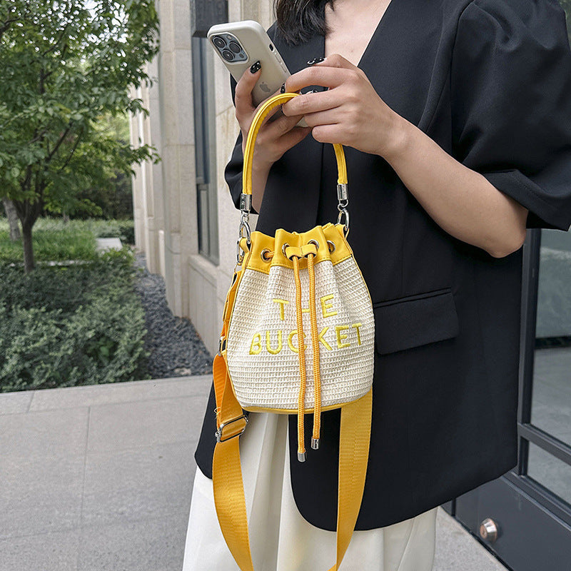 Woven handbag small bag women's new straw bucket bag summer popular niche style shoulder crossbody bag cylinder