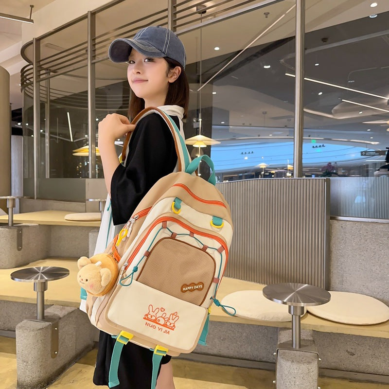 New large-capacity backpack simple female college student lightweight fashion backpack junior high school student schoolbag