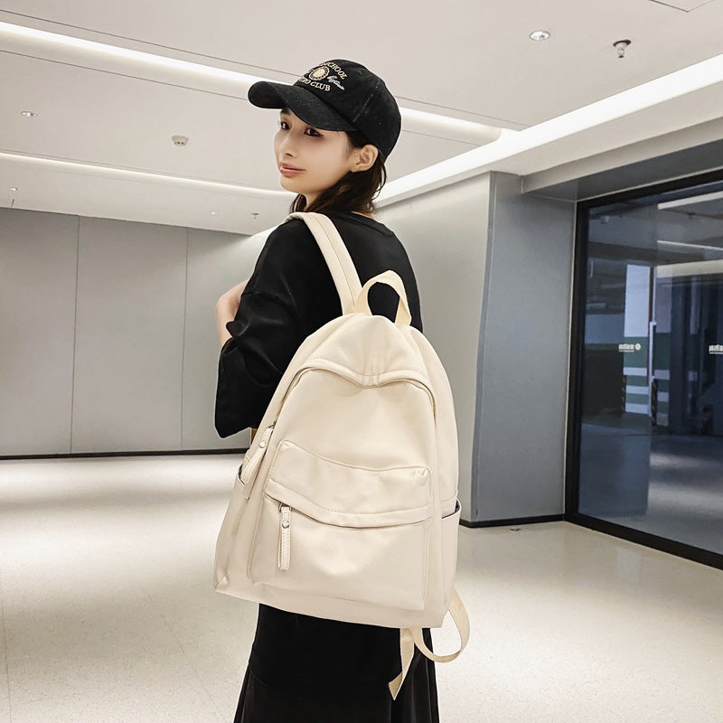 Student backpack upgraded PU Korean version fashion trendy large-capacity anti-splashing water junior high school student casual backpack