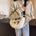 Niche style canvas bag for women 2024 spring and summer new arrivalcasual large capacity student shoulder work clothing bag crossbody dumpling bag