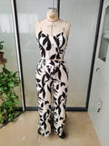 Two-piece set featuring a spaghetti strap elastic tank top and wide-leg tie-front pants,  early autumn european and american style