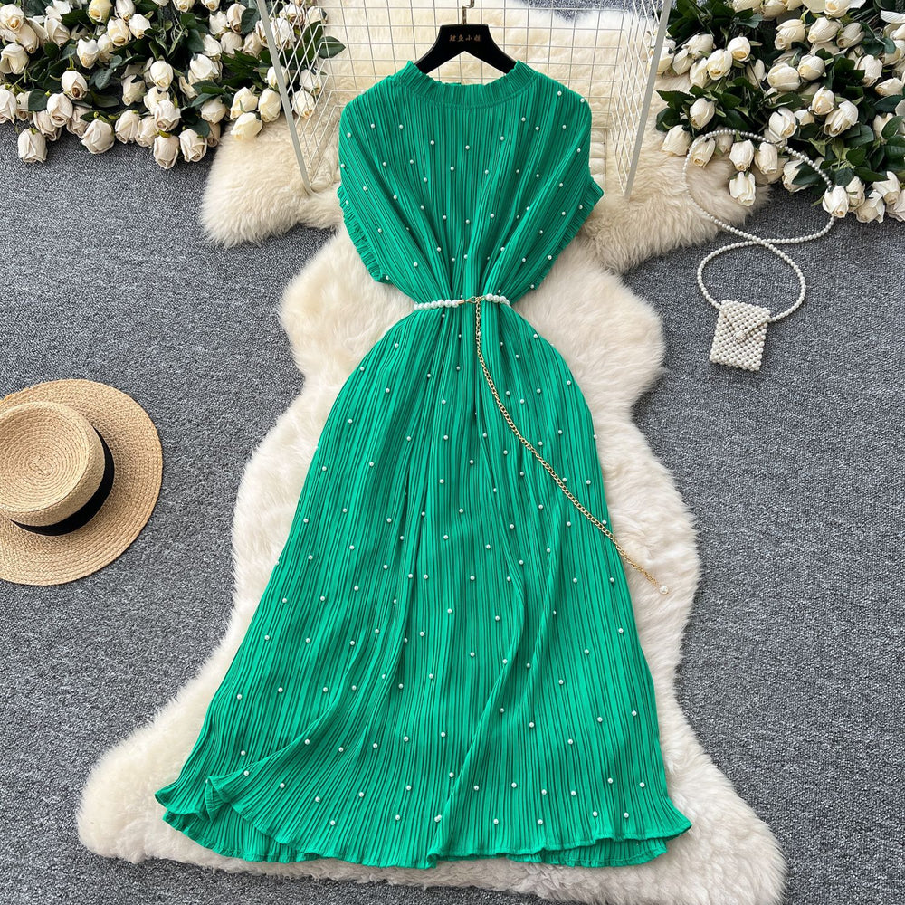 French-inspired v-neck floral chiffon dress with flared sleeves, tie waist, and a figure-flattering, vintage-inspired silhouette