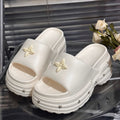 Thick sole rivet slippers women's summer outwear thick sole stomping on shit feeling 2025 new summer popular sandals wholesale