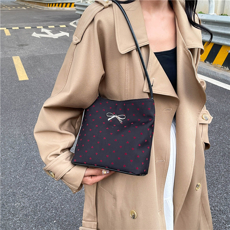 Canvas polka dot bag women's autumn 2025 new fashion commuter bow shoulder bag tote bucket women's bag