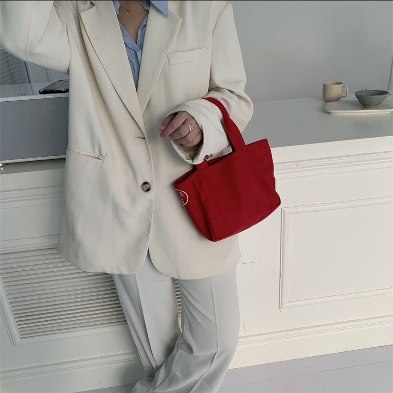 New bag female Korean generation with the same letter printed canvas handbag bento bag simple casual light tote bag