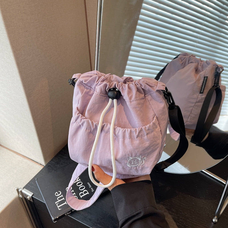 Cross-border pleated bag women's 2025 new popular casual shoulder bag large-capacity messenger bag class commuter bag