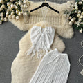 Bohemian beach vacation set for women: summer knit tassel halter top and high-waisted cutout pants two-piece outfit