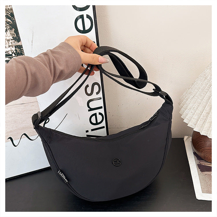 Spring casual macaron color dumpling bag 2026 new versatile crossbody bag women's korean style commuter shoulder bag