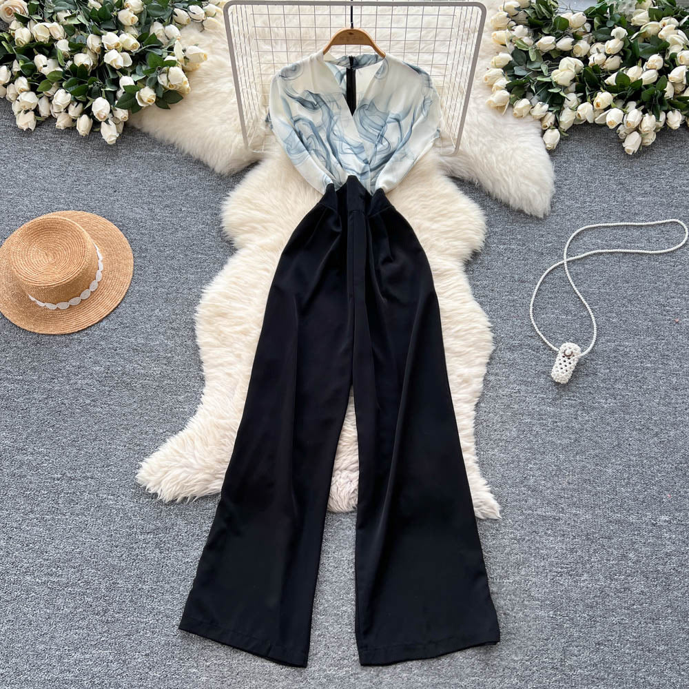 European and american style high-end criss-cross neck flutter sleeve jumpsuit - women's summer slimming wide-leg over-the-knee pants for a chic and powerful look