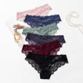 lingerie factory: low-rise, sexy women's panties featuring bow accents, lace detailing, and a breathable, criss-cross design. women's briefs