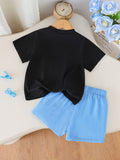 summer girls' outfit: round neck letter print top with sky blue shorts and bow detail - kids' two-piece set