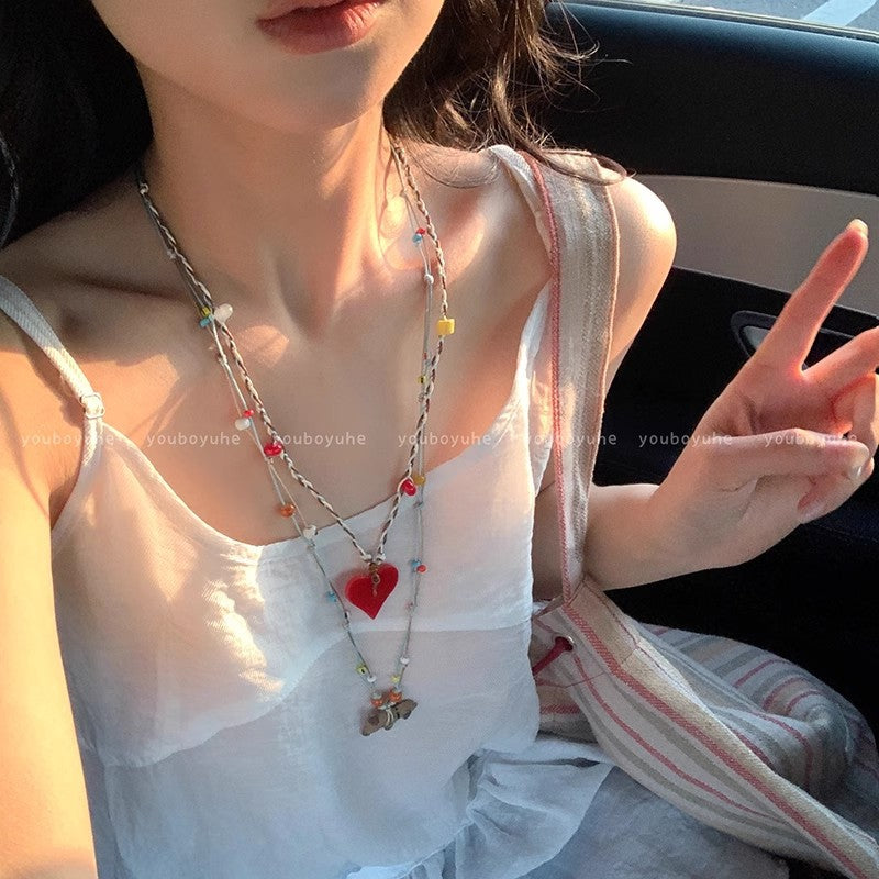 Cute puppy pendant necklace, perfect for summer. a colorful dopamine necklace, long enough to wear with hoodies or as a skirt accessory