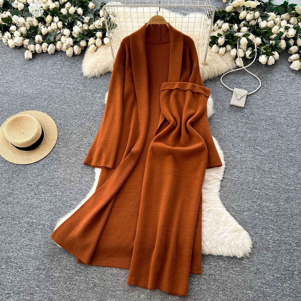 Minimalist solid color knitted mature woman's winter set: slim-fit bandeau dress with long cardigan coat