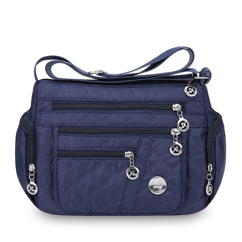 Outdoor casual versatile messenger bag women's large-capacity rhombus embroidery thread simple shoulder bag three-layer storage middle-aged women's bag