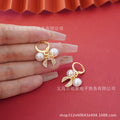 wholesale: a pair of trendy bow earrings. gold-plated bow tie earrings, perfect for everyday wear