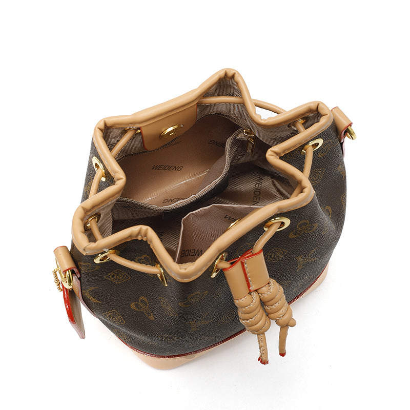 Cross-border women's fashion messenger bag new niche design drawstring bucket bag old flower women's bag commuter shoulder bag