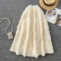 French chic floral midi skirt - high-waisted, slimming a-line design for women's spring collection