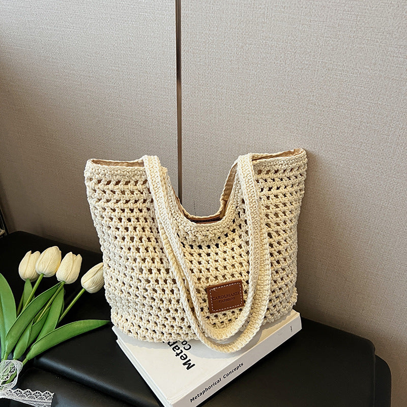 Cross-border commuting large-capacity hollow woven bag women's 2025 new versatile shoulder bag casual knitted tote bag