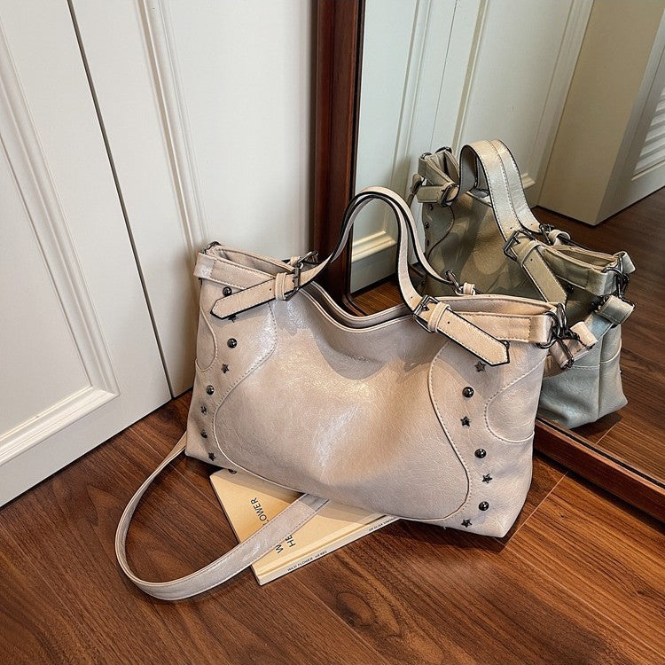 Cross-border retro bag women's large capacity 2025 new summer casual messenger bag rivet portable commuter tote bag