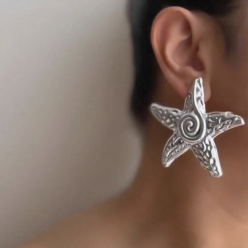 Wholesale seaside earrings: cross-border summer ocean resort style alloy starfish earrings for women - european and american niche exaggerated dangle earrings