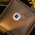hot-selling fashion light luxury square necklace, earrings, and ring set, featuring sapphire accents. a sophisticated and versatile accessory, perfect for pairing with sweaters and other outfits
