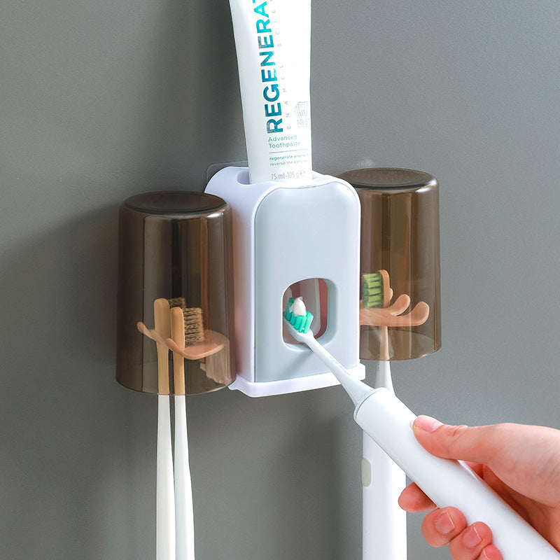 New toothbrush holder and cup set, wall-mounted, no-drill installation, perfect for home use. includes a toothbrush rack and automatic toothpaste dispenser