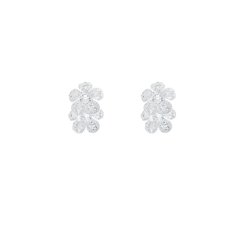 Micro-paved zirconia flower stud earrings - trendy, chic, and effortlessly elegant. a versatile and minimalist accessory for women