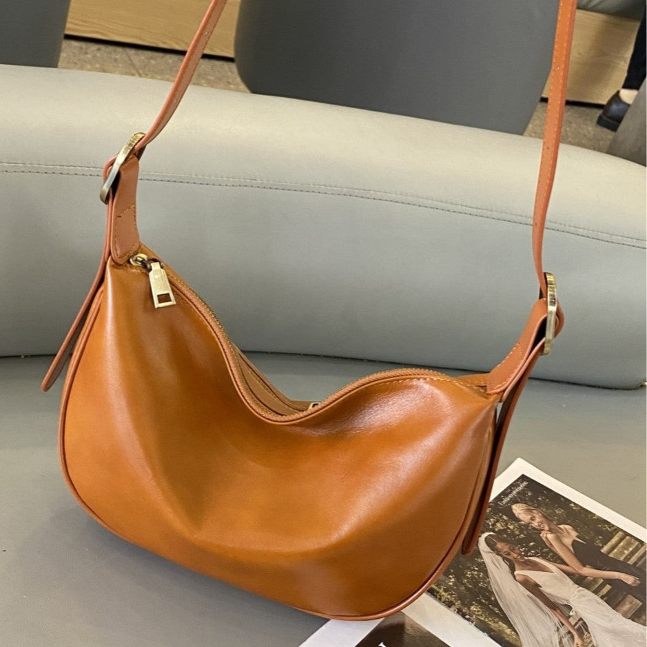 Genuine leather women's bag 2025 new fashion underarm dumpling bag retro commuter cowhide shoulder crossbody bag women's saddle bag