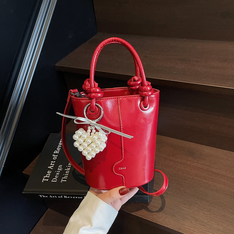 Cross-border high-end foreign-style handbag women's 2025 trendy niche design bucket bag popular versatile messenger bag