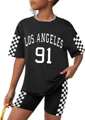Girls' t-shirt and shorts set featuring a cartoon short-sleeve design and printed graphics, perfect for casual streetwear