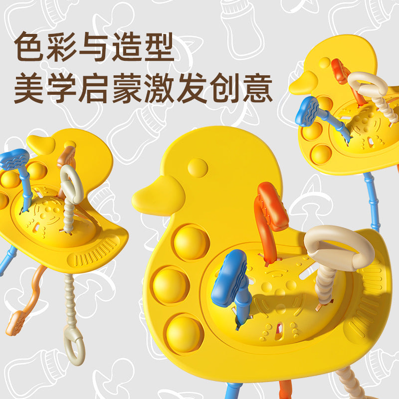 Cross-border yellow duck silicone lala music draw music baby early education draw hand grab ball can bite lala music toy