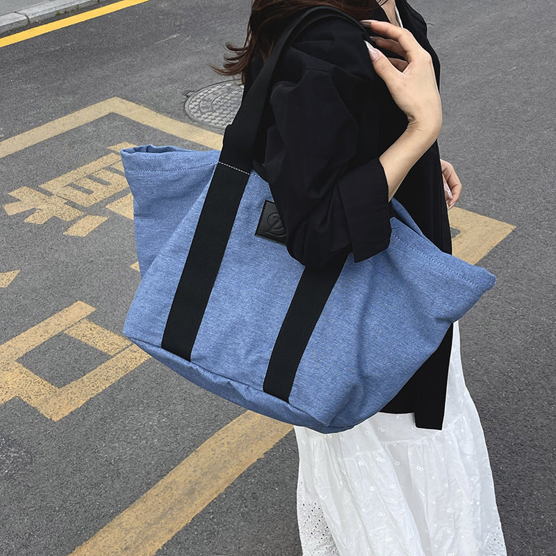 Casual large-capacity denim bag, women's 2025 new lightweight and versatile commuter shoulder bag, portable tote bag