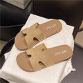 French open-toe flip-flops women's outerwear 2025 summer new style vacation flat anti-slip beach sandals